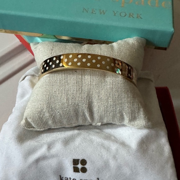 Kate Spade Gold Bangle with white Polka Dots - Picture 2 of 5